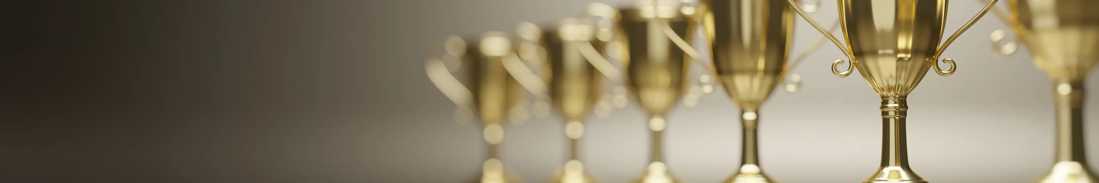 close-up-gold-trophy-award-3d-rendering